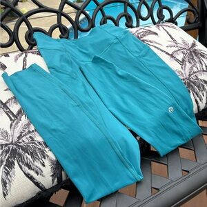 NWOT Lululemon fast & free tight ll.
25” inseam cut hem, w/ pockets. Cyprus.